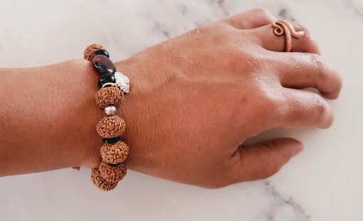 9 Mukhi Rudraksha with Gomed and Black Ebony Bracelet for Crown Chakra to Attracts divine grace and develops an awareness to recognize spiritual help