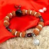 9 Mukhi Rudraksha and Gomed Bracelet for Crown Chakra to Brings positivity, contentment, and gratification of senses to feel the grace of the divine