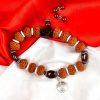 9 Mukhi Rudraksha and Gomed Bracelet for Crown Chakra to Brings positivity, contentment, and gratification of senses to feel the grace of the divine