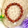 10 Mukhi Rudraksha Krishna Bracelet with Carnelian For blessings of fruitful relationship, happiness and wealth