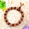 10 Mukhi Rudraksha Krishna Bracelet with Red Sandalwood To promote creativity, peace, perseverance and joy