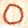 8 Mukhi Rudraksha Ganesha Bracelet with Red Agate to remove obstacles in path, destroys evils and brings success