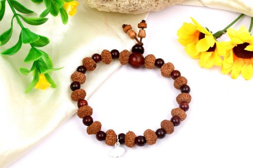 9 Mukhi Rudraksha Durga Bracelet with Red Sandalwood to brings name, fame, success and material comforts