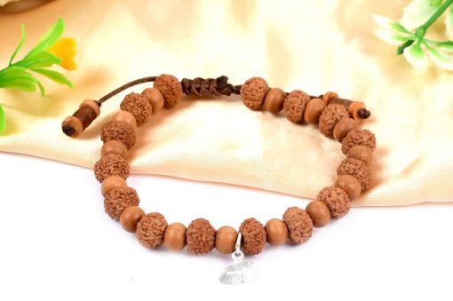 9 Mukhi Rudraksha Durga Bracelet with Sandalwood To attain worldly comforts and fulfilment of desires