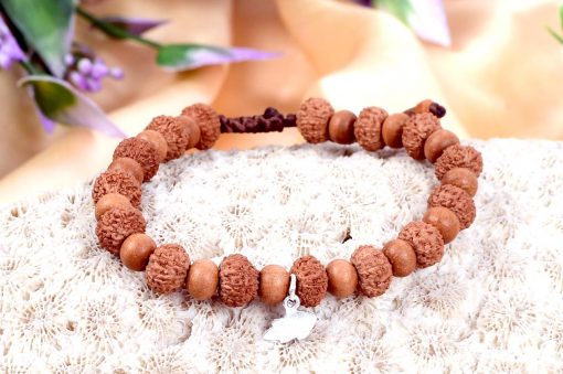 9 Mukhi Rudraksha Durga Bracelet with Sandalwood To attain worldly comforts and fulfilment of desires