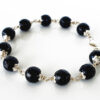 Black agate faceted bracelet in pure silver flower caps - To enhances confidence