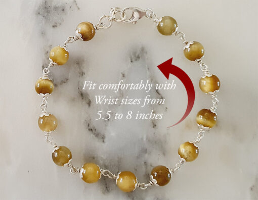 Cats Eye Bracelet in pure silver flower caps to bring good fortune and walk through fears to achieve goals