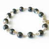 Hematite Bracelet in pure silver flower caps - To brings calmness, balance and clarity