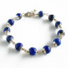 Lapis Lazuli in pure silver flower caps For enhancing love and fidelity