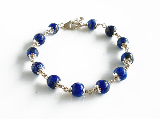 Lapis Lazuli in pure silver flower caps For enhancing love and fidelity