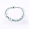 Aquamarine button shape bracelet with silver balls - Faceted beads