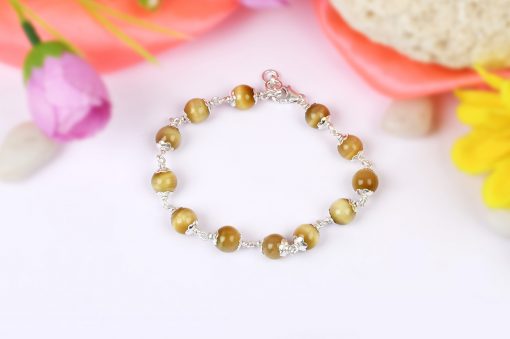 Cats Eye Bracelet in pure silver flower caps to bring good fortune and walk through fears to achieve goals