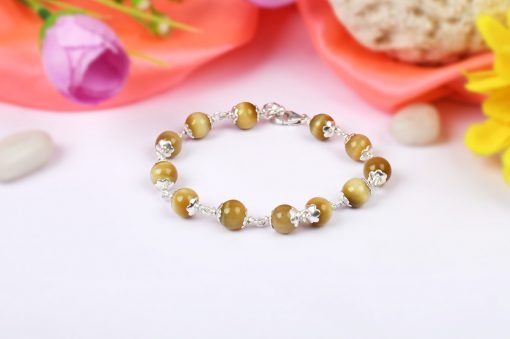 Cats Eye Bracelet in pure silver flower caps to bring good fortune and walk through fears to achieve goals