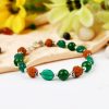 Rudraksha and Green Onyx bracelet - for building relationships and for spiritual growth