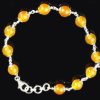 Yellow Agate Bracelet in pure silver flower caps - For protection, courage and success