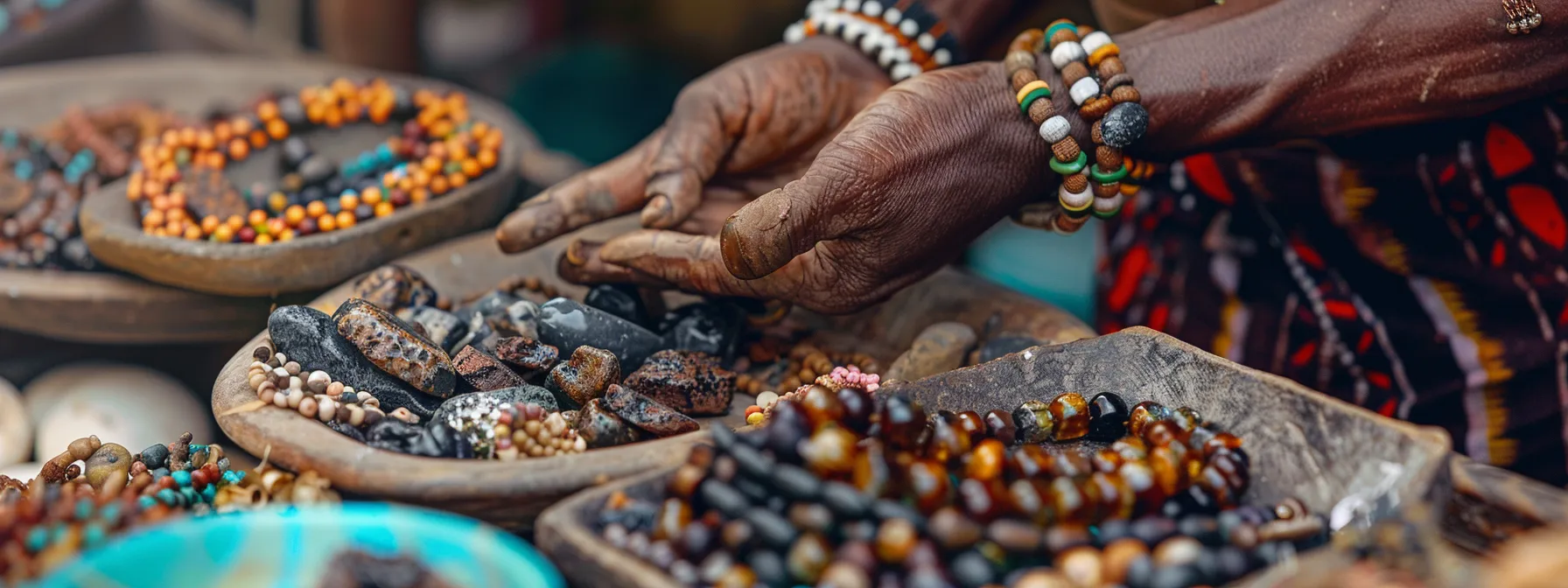 a person carefully examining a black onyx gemstone set in a clay setting, surrounded by other african gemstone jewelry pieces in a vibrant market setting.