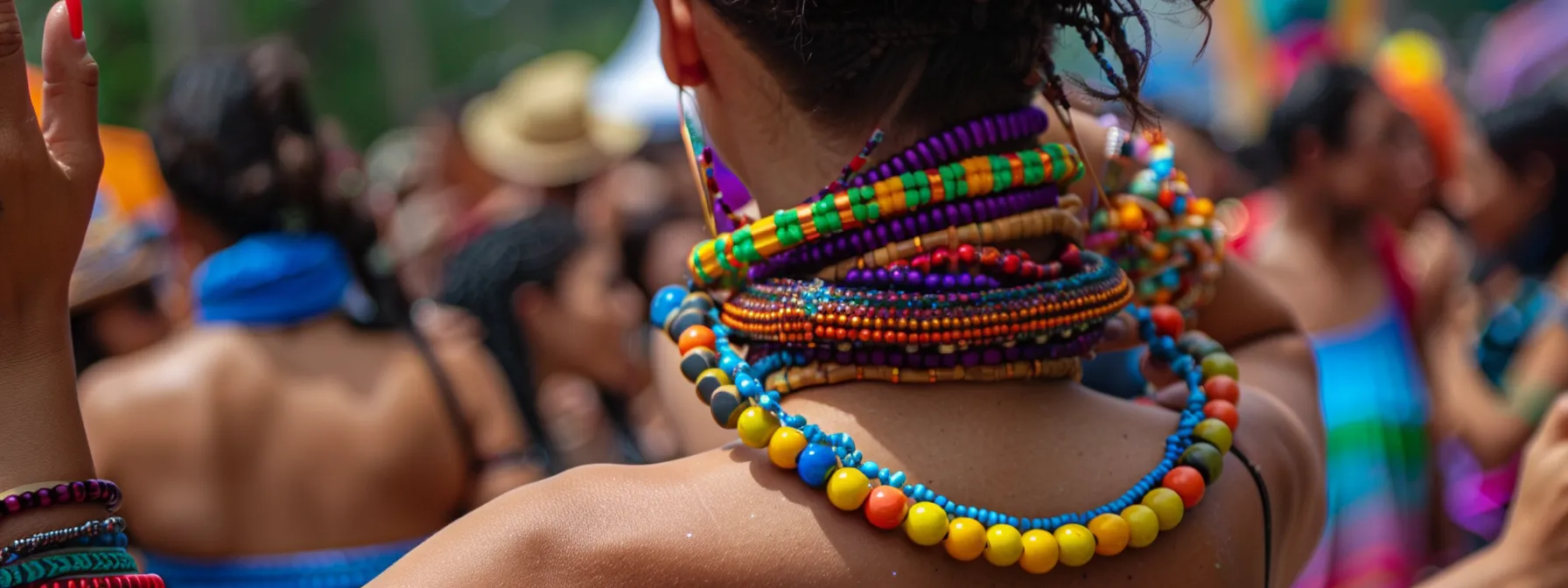 a woman wearing a stack of colorful gemstone bracelets dancing at a brazilian festival.