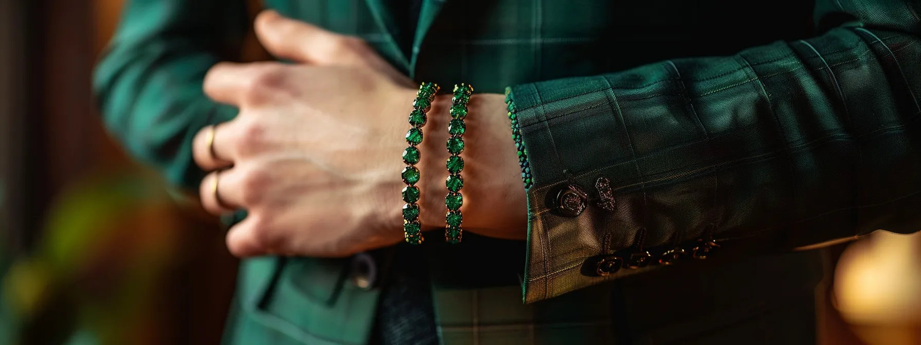 a person wearing a green emerald gemstone bracelet with a matching outfit, creating a harmonious look.