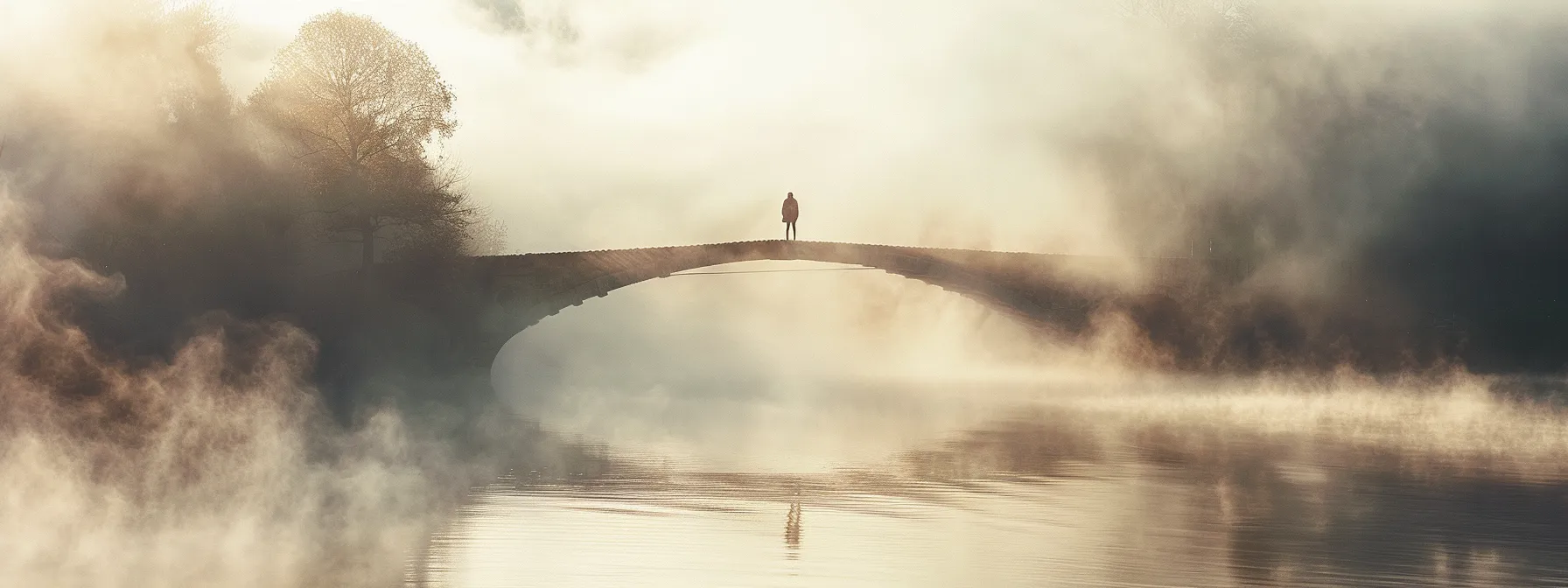 a lone figure standing at the edge of a fog-covered bridge, symbolizing a journey through uncertainty and fear towards personal growth.