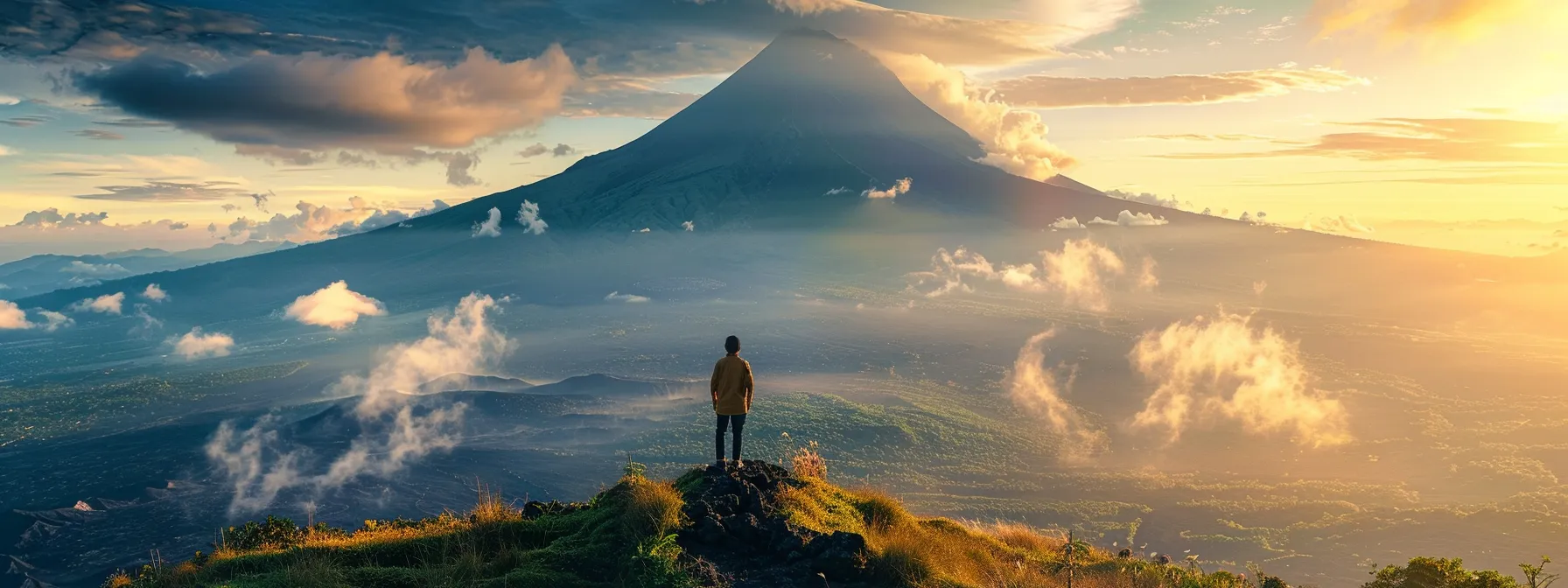 a person standing confidently in front of a mountain, symbolizing the mental resilience and determination needed to achieve their goals.