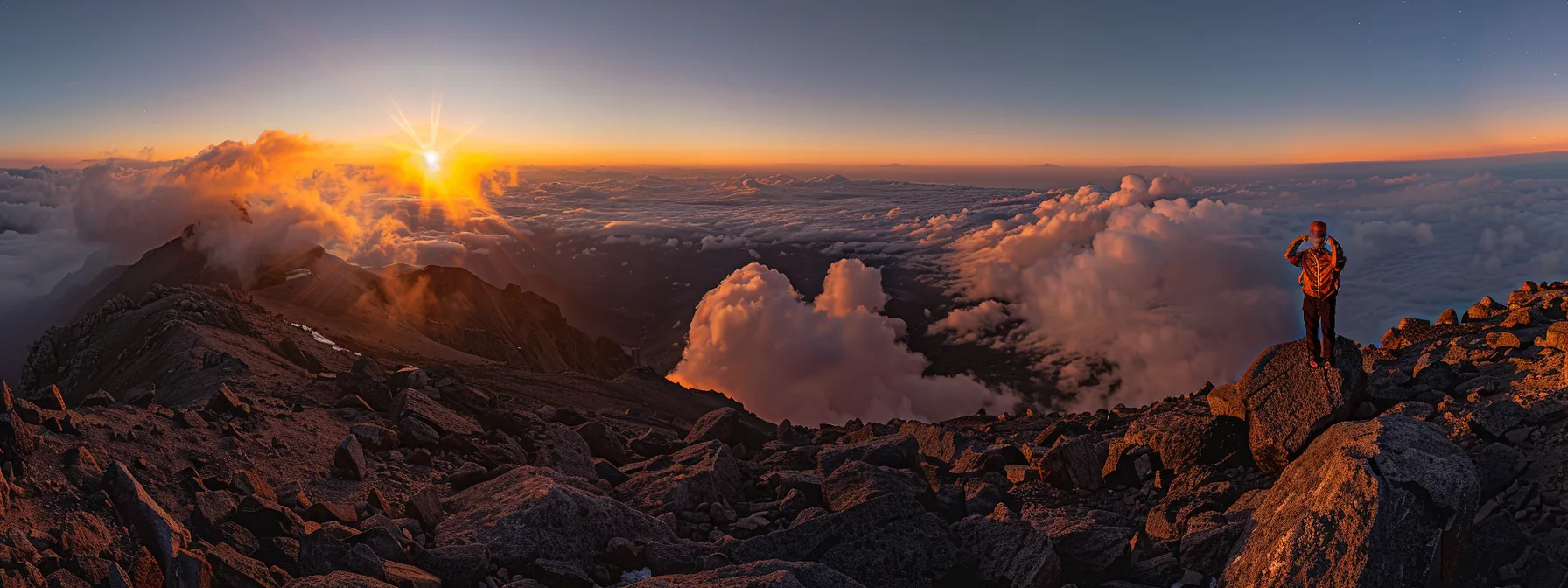 a person standing at the summit of a mountain, arms raised in triumph, gazing at the glowing sunrise over a sea of clouds.