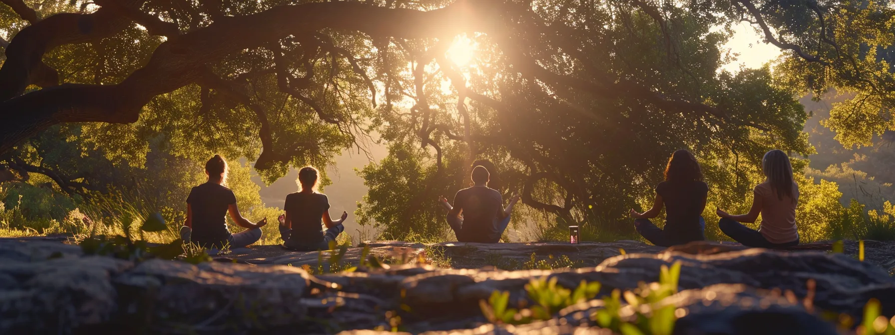 a group of individuals practicing cardiac coherence in a serene natural setting, radiating a sense of inner peace and connection.