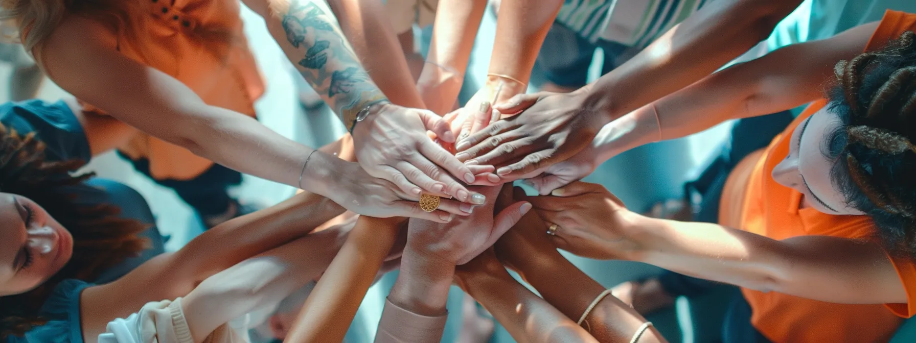 a group of individuals participating in hands-on belief change exercises, intensely focused on transforming their mindset and fostering personal development.