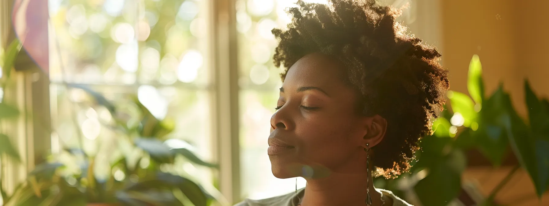 a serene and focused individual sitting with closed eyes, surrounded by a gentle glow of light, as a certified psych-k facilitator guides them through a session.