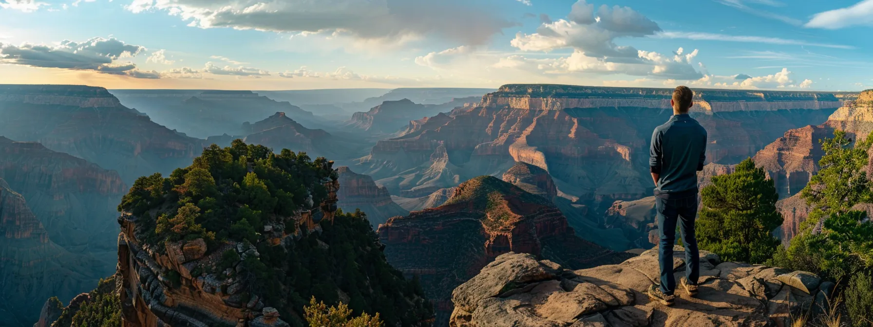 a confident individual standing at the edge of a scenic overlook, staring out at a vast landscape, embodying the wealth mindset concept.