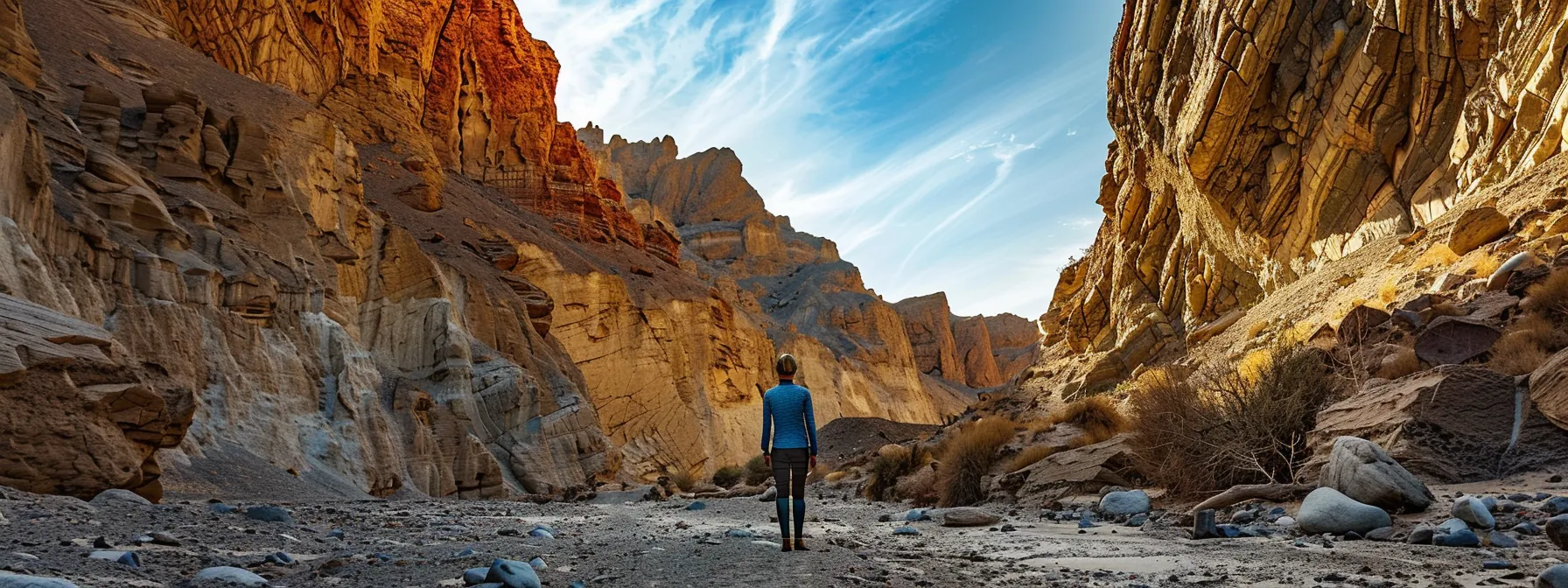 a determined individual standing confidently in front of a mountain, symbolizing overcoming challenges and staying committed.