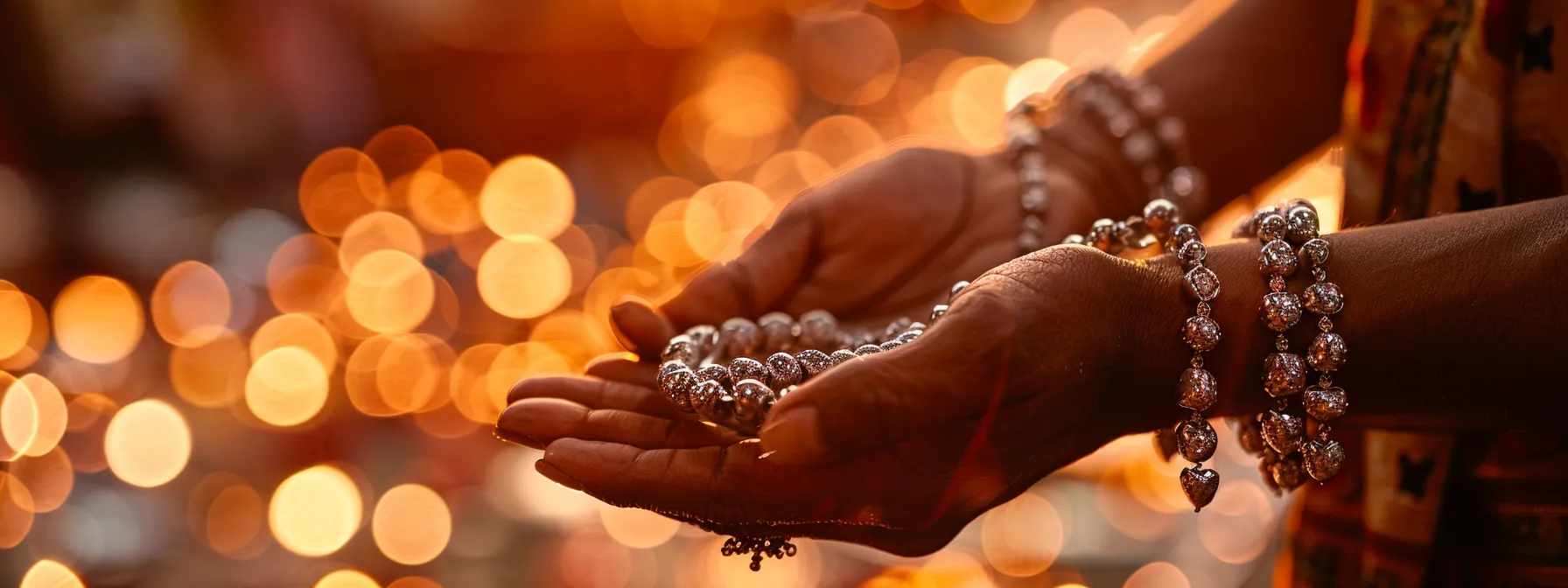 a devoted worshipper clasping a shiny silver chain adorned with the ten mukhi rudraksha, bathed in a warm glow of spiritual reverence.