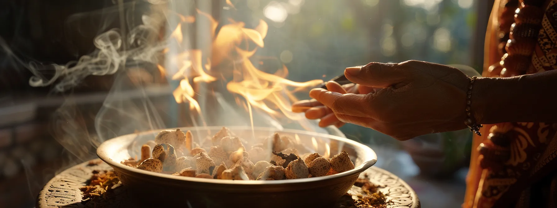 a person carefully burning sacred herbs around a twelve mukhi rudraksha, ensuring proper purification for maximum spiritual potential.