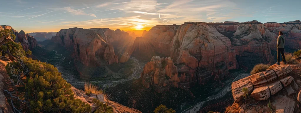 a person standing at the top of a mountain, gazing out at a vast, inspiring landscape as the sun rises, symbolizing the potential for growth and transformation.