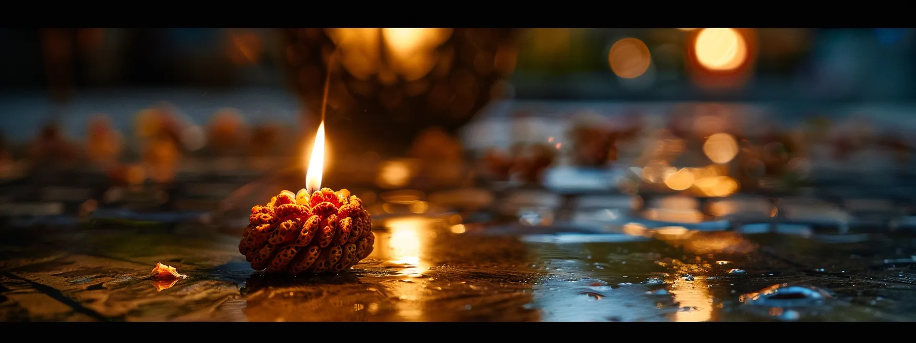 a serene moment of a glowing ten mukhi rudraksha bead being cleansed and energized with sacred rituals.