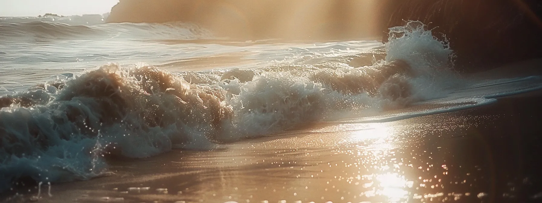 a serene, sunlit beach with crystal-clear waves, symbolizing the powerful effects of positive thoughts and the law of attraction.