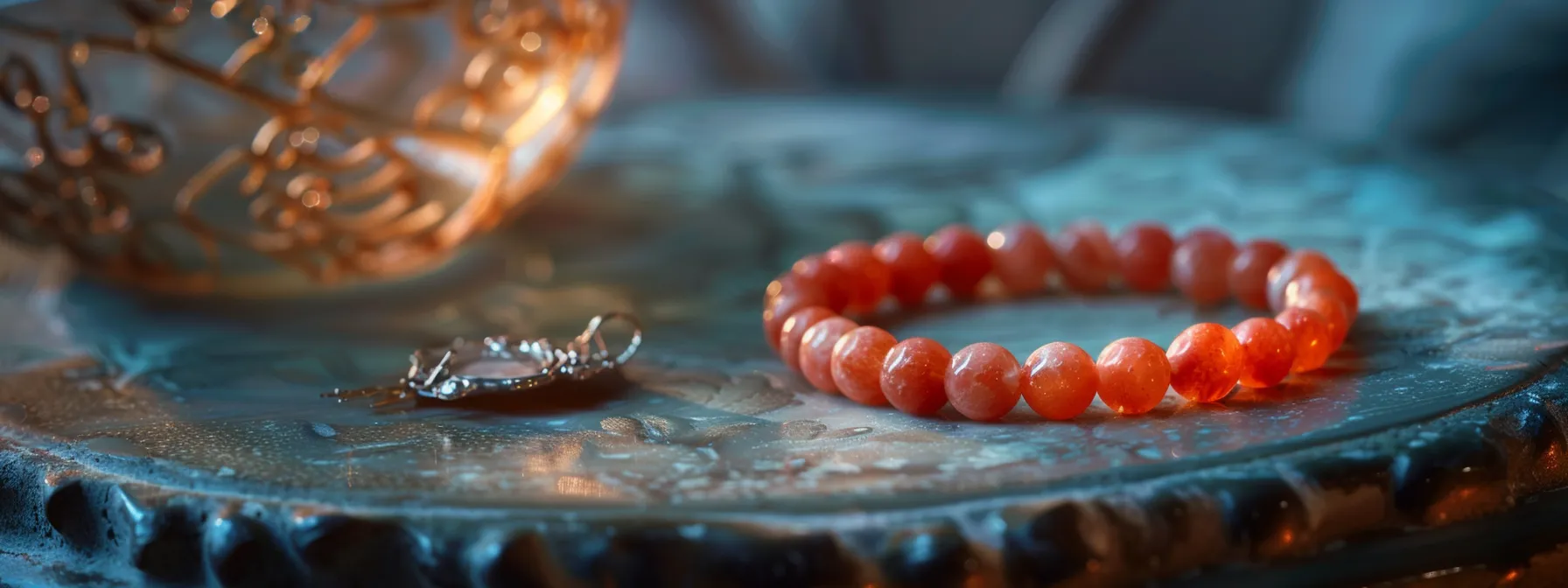 a vibrant coral bracelet gently resting on a soft velvet cushion, surrounded by delicate cleaning tools and a small container of jewelry polish.