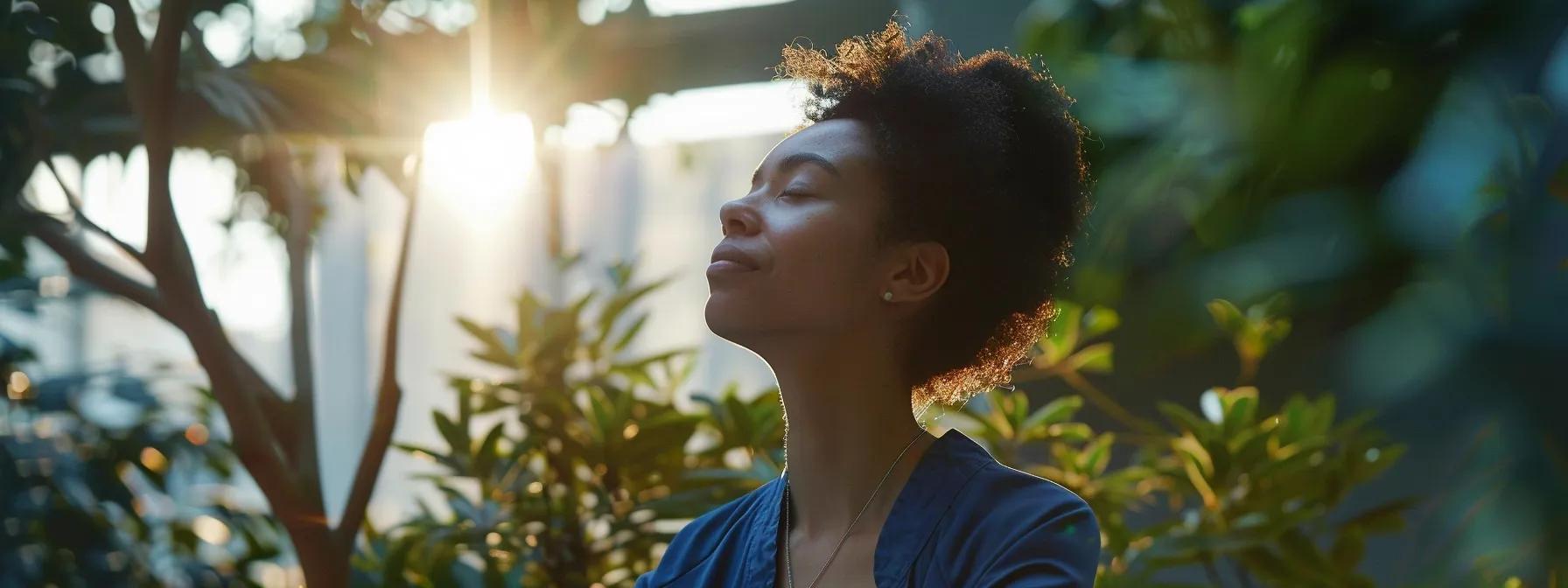 a person sitting in a peaceful setting, eyes closed, visualizing their goals with a vibrant and detailed mental image.